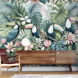 Tropical bird wallpaper with toucans and monstera leaves creating a peaceful atmosphere in a modern living room