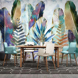 Botanical wall mural featuring navy and gold feathers transforming a bedroom into a peaceful retreat