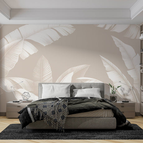 Tropical banana leaf wallpaper in modern living room, white leaves on beige creating a bright, airy atmosphere