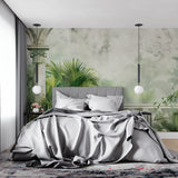 Tropical paradise mural creating a calm atmosphere in a luxury bathroom setting