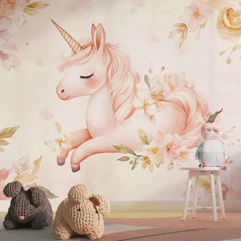 Girls bedroom with unicorn wallpaper featuring soft pink and gold accents