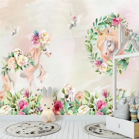Unicorn garden wallpaper in a bright girl's bedroom, showing pink roses and magical unicorns dancing across the wall