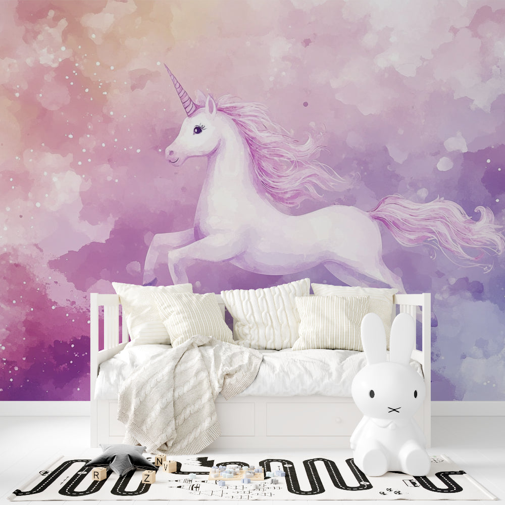Magical unicorn wall mural displayed in a playroom setting with soft lighting highlighting the watercolor effects