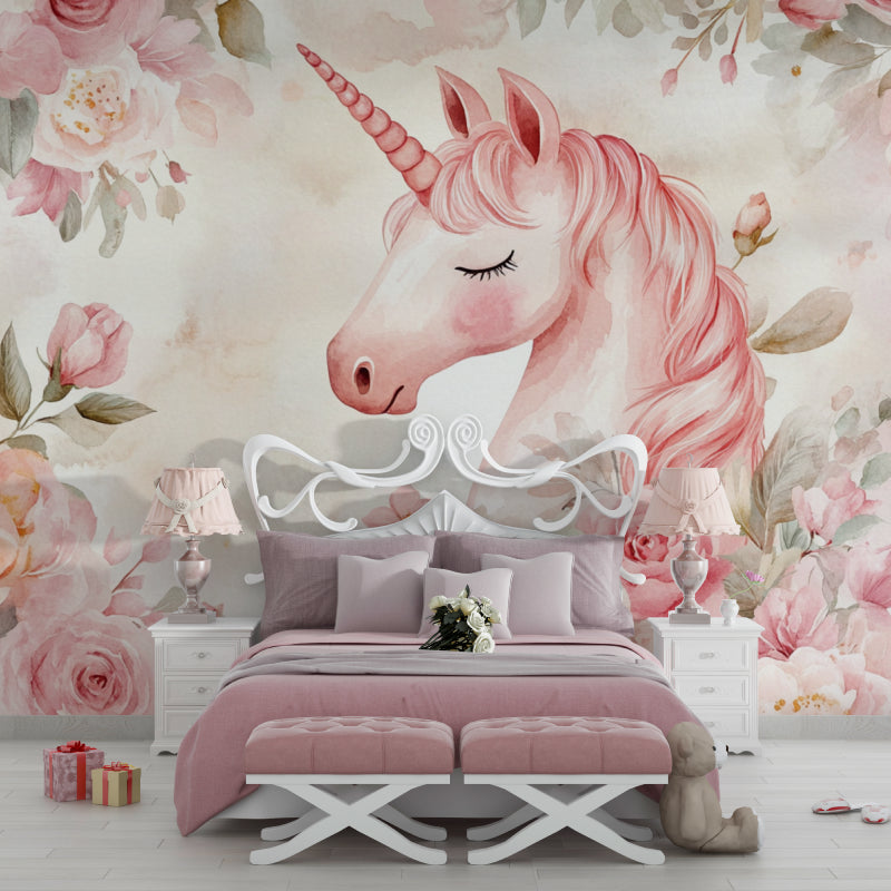 Pink unicorn mural in a reading nook with soft cushions