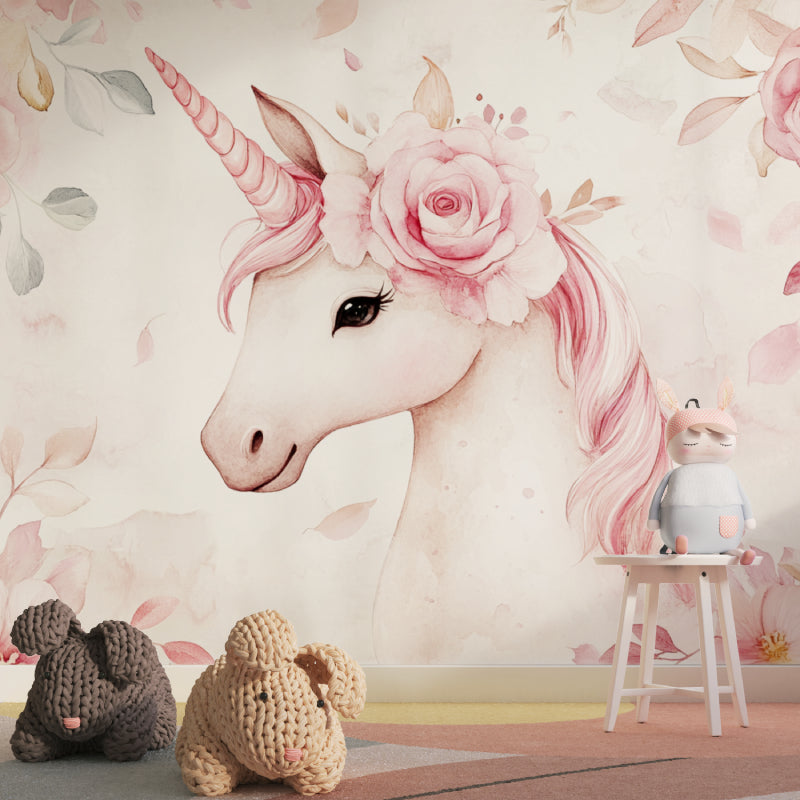 Pink unicorn wallpaper creating magic in a cozy nursery with soft lighting
