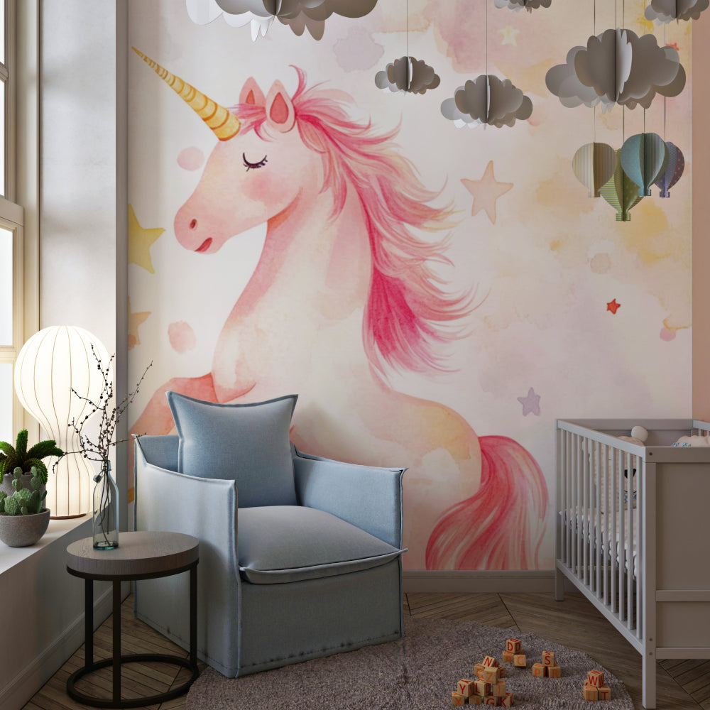 Pink unicorn wallpaper with gold stars creating magic in a modern nursery with white furniture