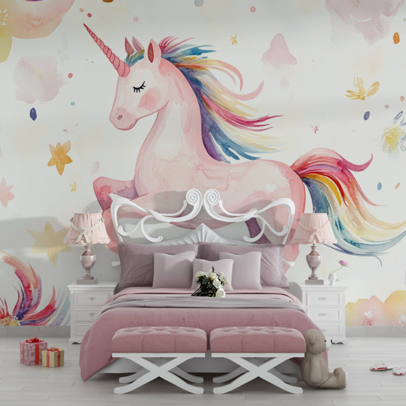 Rainbow unicorn wall mural creating a dreamy atmosphere in a girl's bedroom
