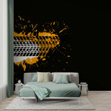 Black and orange geometric wallpaper creating depth in a contemporary living room