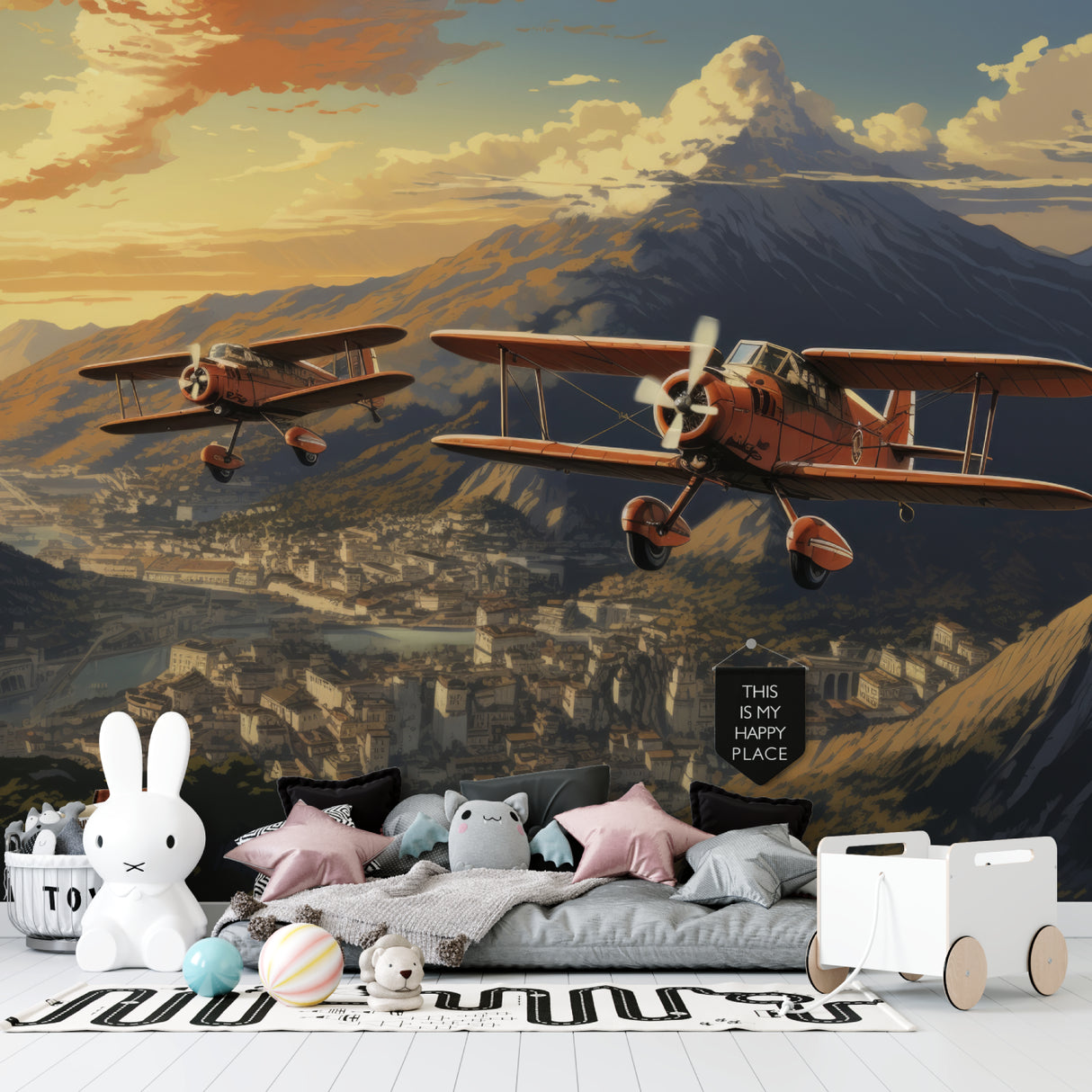 Aviation themed nursery with mountain sunset airplane mural creating warm atmosphere