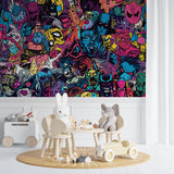 Vintage airplane mural creating statement wall in boy's bedroom with coastal scene
