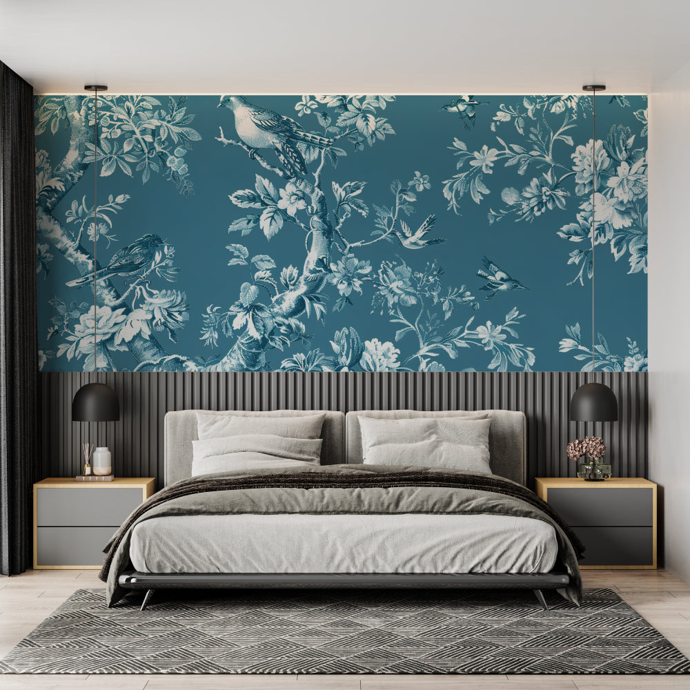 Vintage bird wallpaper in bright master bedroom, showing blue and silver pattern catching morning light