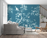 Vintage floral wall mural in cozy reading nook with natural lighting