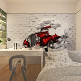 Classic Auto Mural makes statement in man cave with red vintage car design