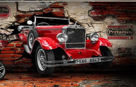 Design file showing detailed red vintage automobile breaking through textured brick wall pattern