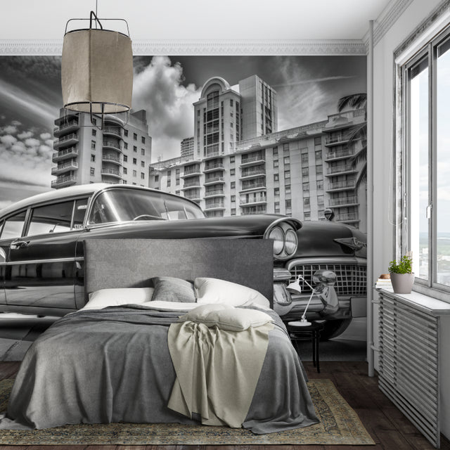 Vintage car wallpaper creating striking focal point in modern living room with Art Deco elements