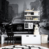 Retro car mural wallpaper installation in contemporary living space