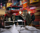 Classic car mural transforming a man cave with neon city backdrop