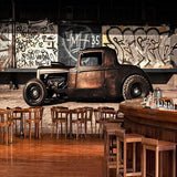 Industrial style car mural transforming a home office with urban edge