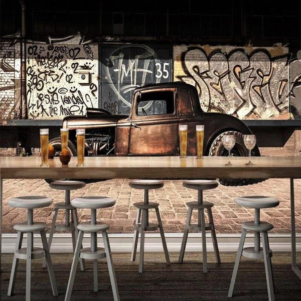 Graffiti car wallpaper making a statement in a modern dining room