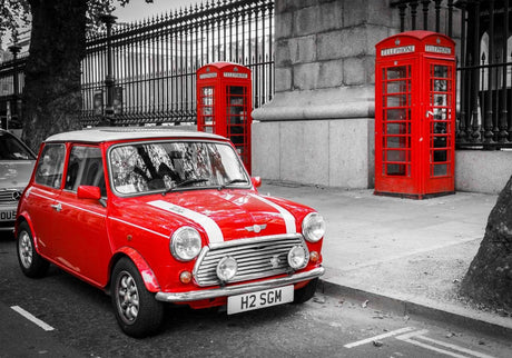 Design file of red Mini Cooper against black and white London street scene with telephone booth
