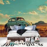 Desert landscape mural with turquoise Beetle enhances hallway design
