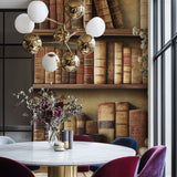 Trompe l'oeil bookshelf mural creating depth in a small reading corner