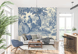 Blue and beige Toile pattern enhancing a hallway with antique furnishings