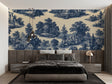 Blue Toile de Jouy wallpaper in an elegant dining room with natural light highlighting the detailed pastoral scenes
