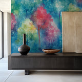 Watercolor forest wallpaper bringing color to a minimalist dining room
