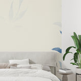 Blue watercolor leaves creating peaceful yoga room atmosphere