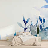 Watercolor leaf mural in master bedroom with natural light highlighting blue tones