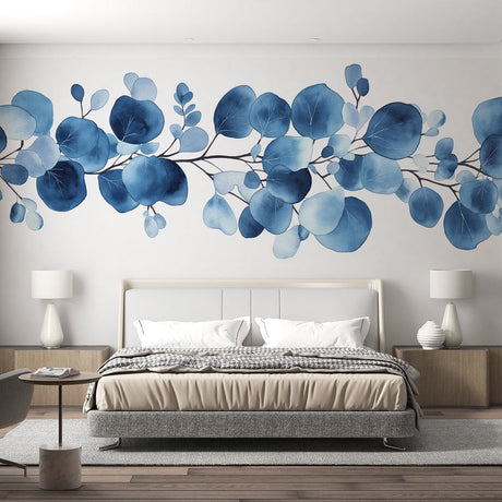 Blue Eucalyptus Watercolor Wallpaper creates a serene atmosphere in a modern bedroom with white furniture