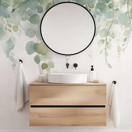 Eucalyptus watercolor wallpaper creating a serene atmosphere in a modern bathroom with white fixtures and natural wood accents