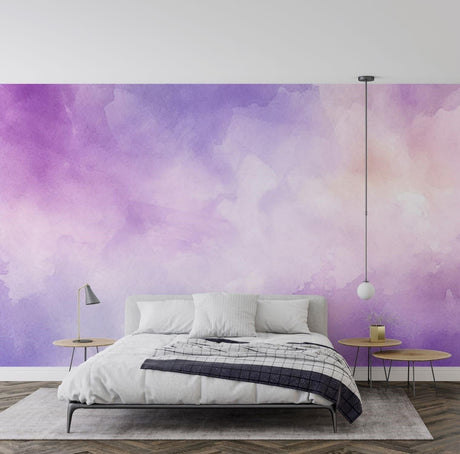 Purple watercolor cloud wallpaper creating a dreamy atmosphere in a modern bedroom