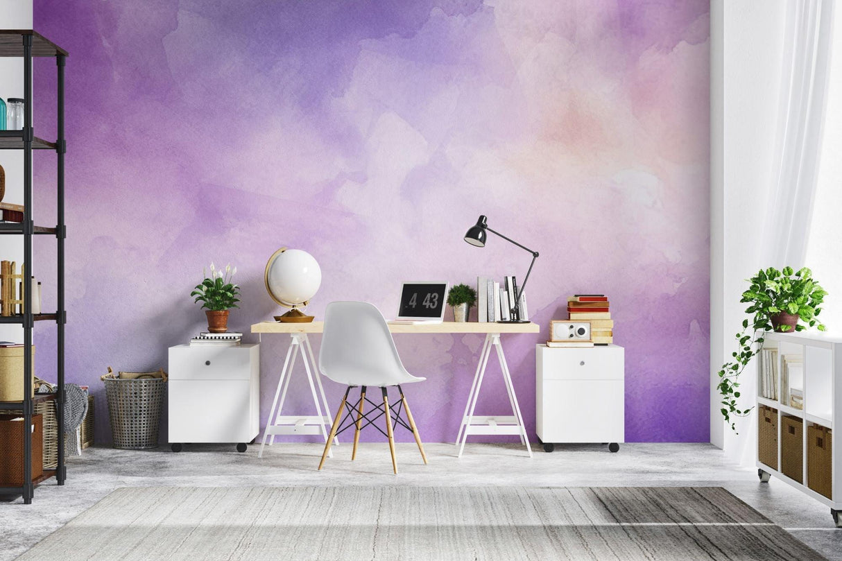 Pink and purple cloud wallpaper transforming a home office into a calm workspace