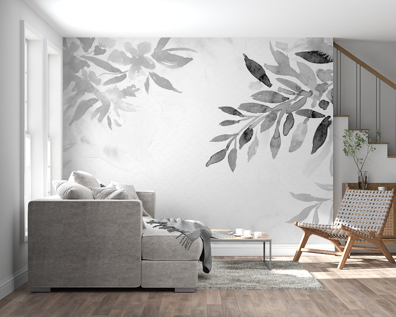 Grey botanical wallpaper mural in modern living room showing calm watercolor leaves pattern