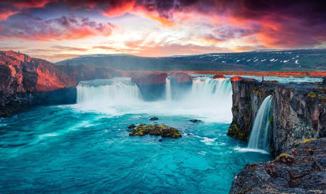 Waterfall landscape design file showing detailed turquoise waters and dramatic sunset sky pattern