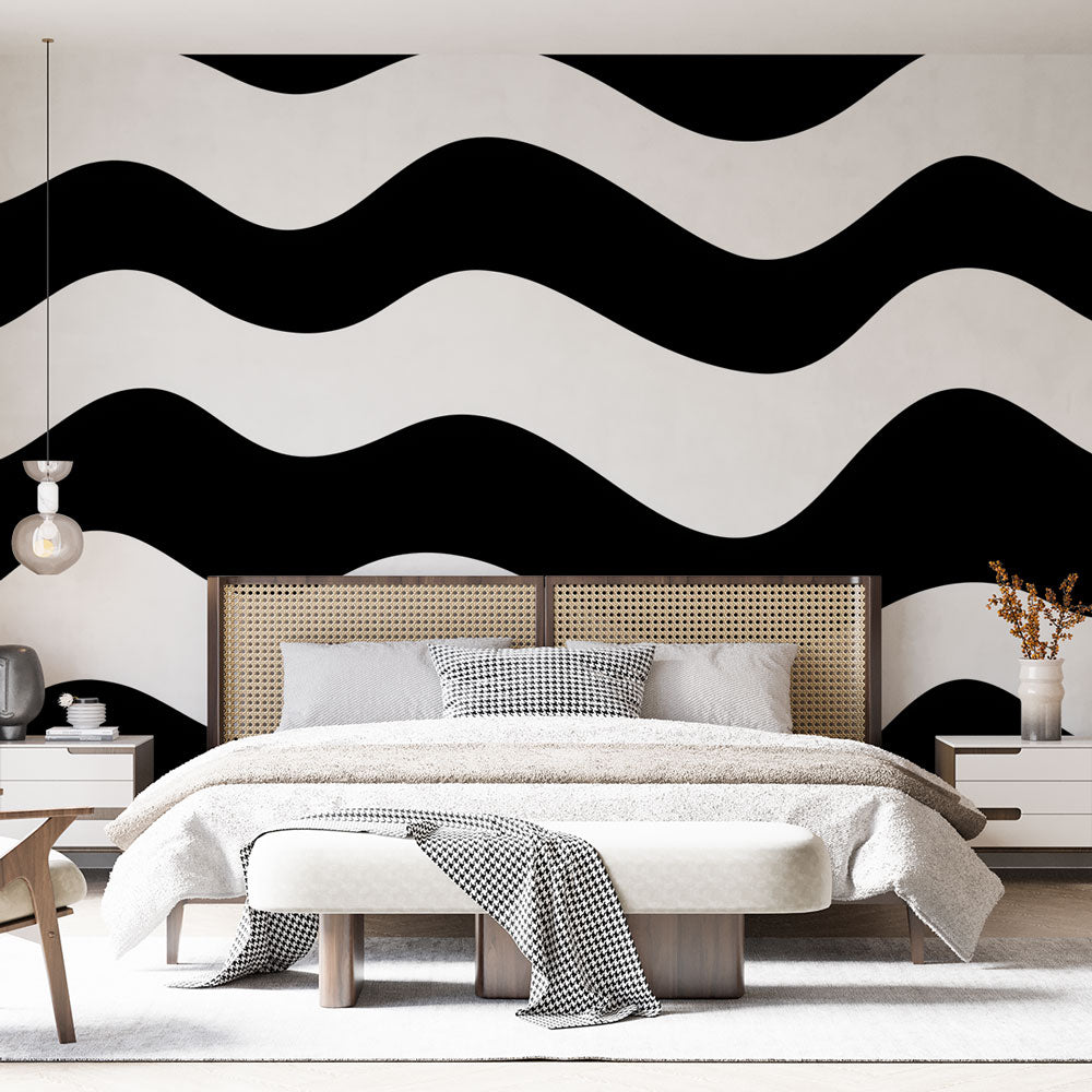 Black and white wave pattern wallpaper showcased in a modern minimalist living room setting
