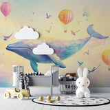 Baby room decorated with gentle whale and hot air balloon wall mural in soft pastel tones