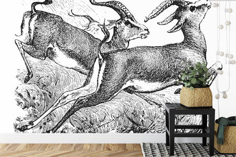 Wildlife wallpaper creating modern contrast in minimalist living room with grey sofa and natural light