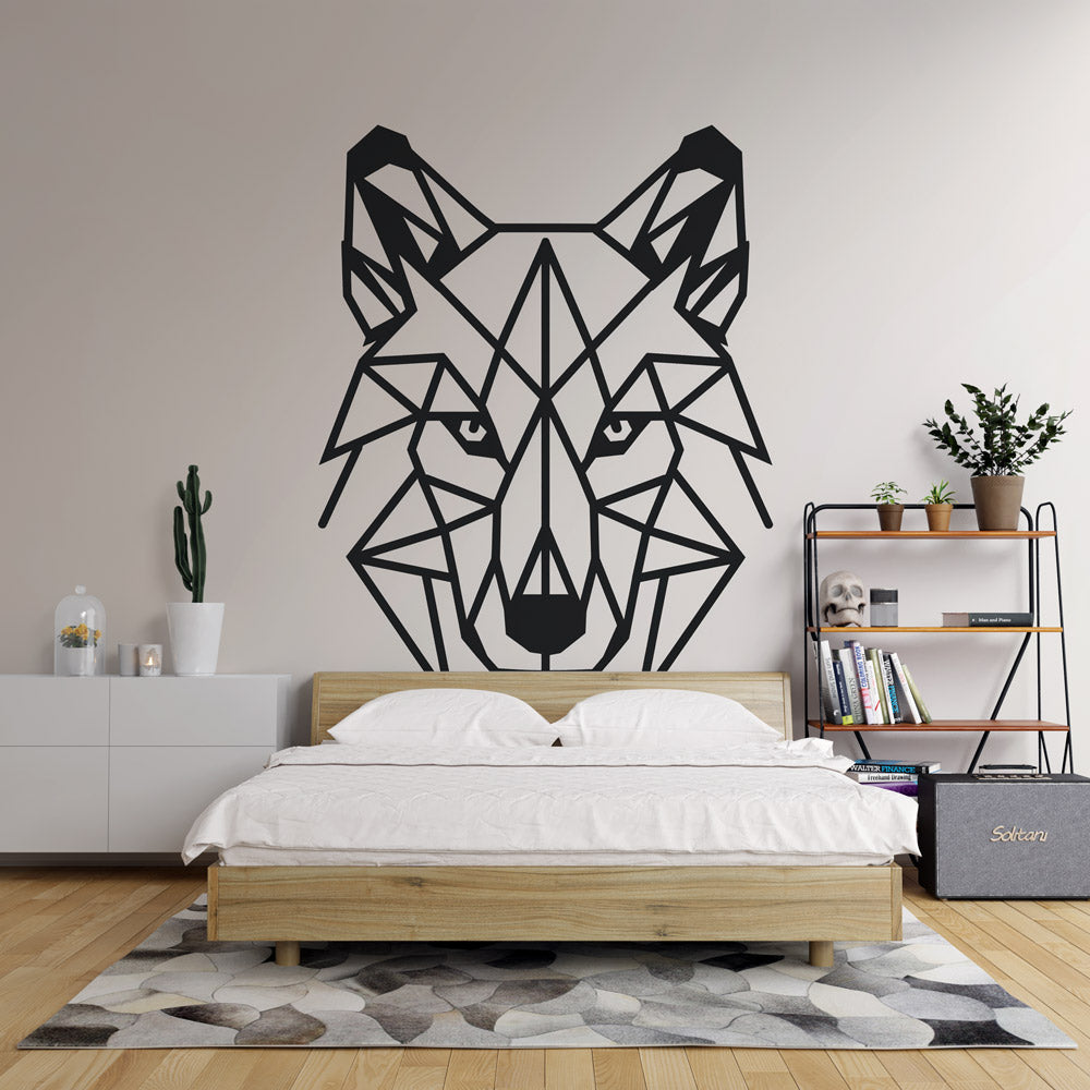 Modern geometric wolf wallpaper displayed in a minimalist living room, showing bold black lines against white walls