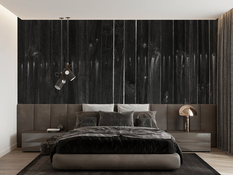 Black wood plank wallpaper in modern living room creating dramatic accent wall behind gray sofa