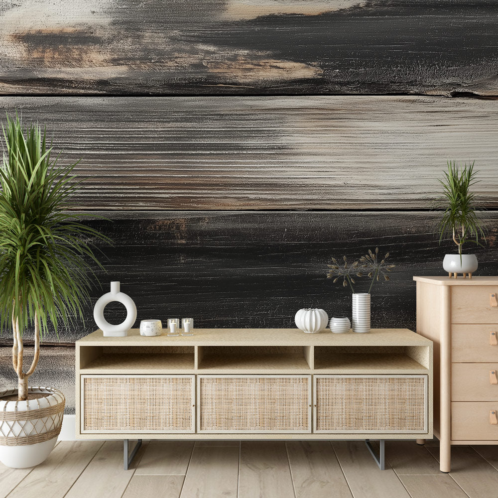 Charred wood wallpaper creating a bold accent wall in a modern living room with minimal furniture and natural light