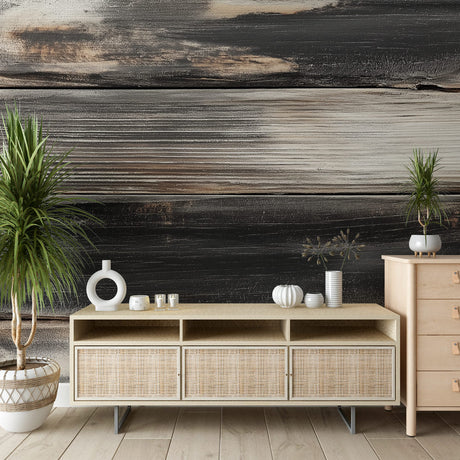 Charred wood wallpaper creating a bold accent wall in a modern living room with minimal furniture and natural light