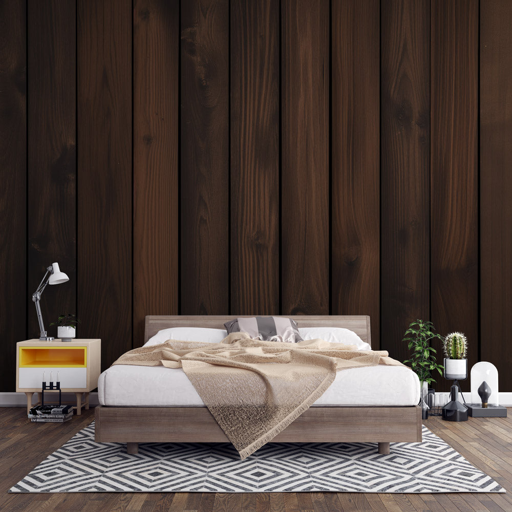 Dark brown wood plank wallpaper in modern dining room with natural light highlighting the vertical grain pattern