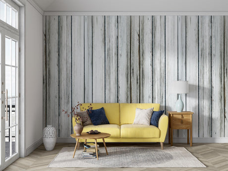 White wood plank wallpaper creating a bright, airy feel in a modern living room with natural lighting