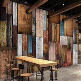 Wooden plank effect wallpaper in industrial style restaurant with exposed brick