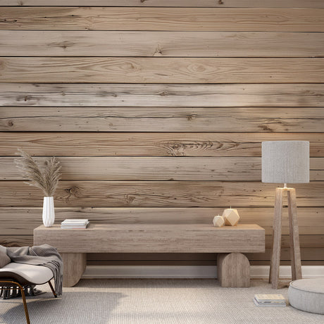 Pine plank wallpaper creating a warm atmosphere in a modern living room with grey sofa and plants