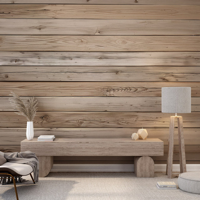 Pine plank wallpaper creating a warm atmosphere in a modern living room with grey sofa and plants