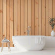 Wood effect wallpaper creating a cozy atmosphere in a modern living room, vertical pine planks adding height and warmth